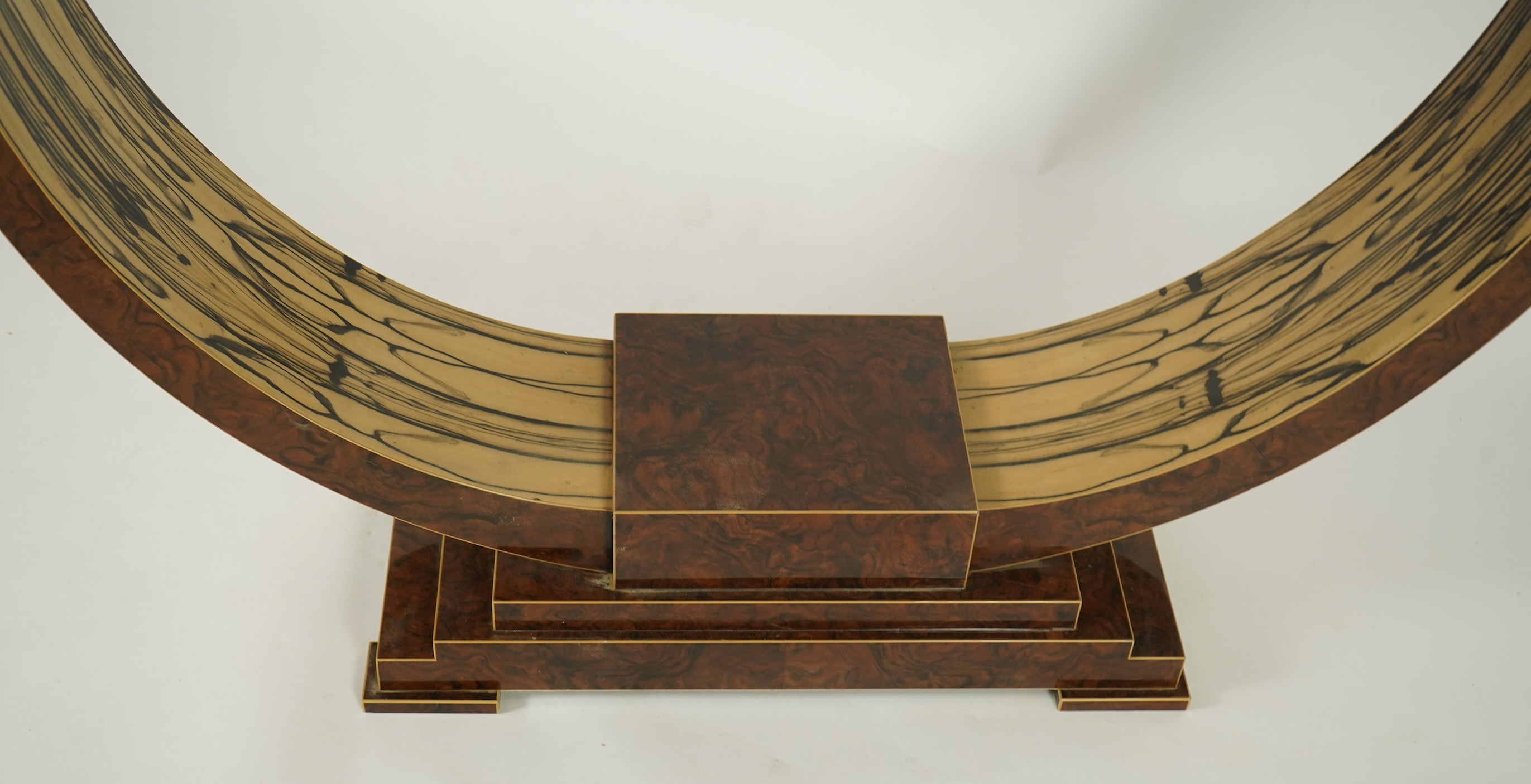 An Art Deco style white ebony and walnut console table